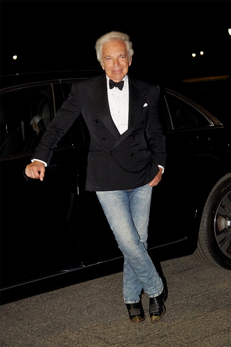 Ralph Lauren, in his signature jeans-and&ndash;a dinner jacket look, arrives at his 50th Anniversary Show in Central Park