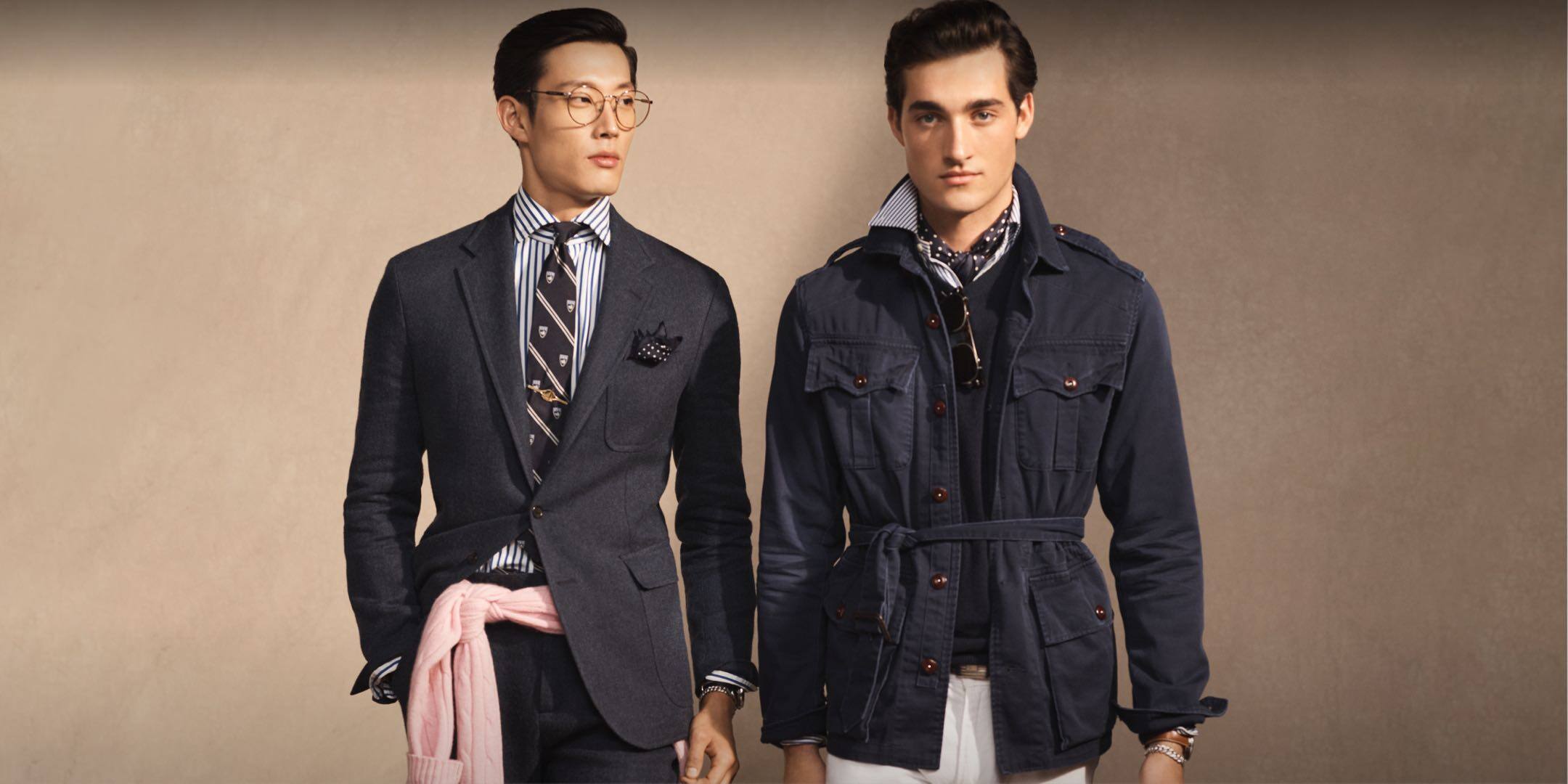 Men wear grey suit jacket and navy blue utility jacket.