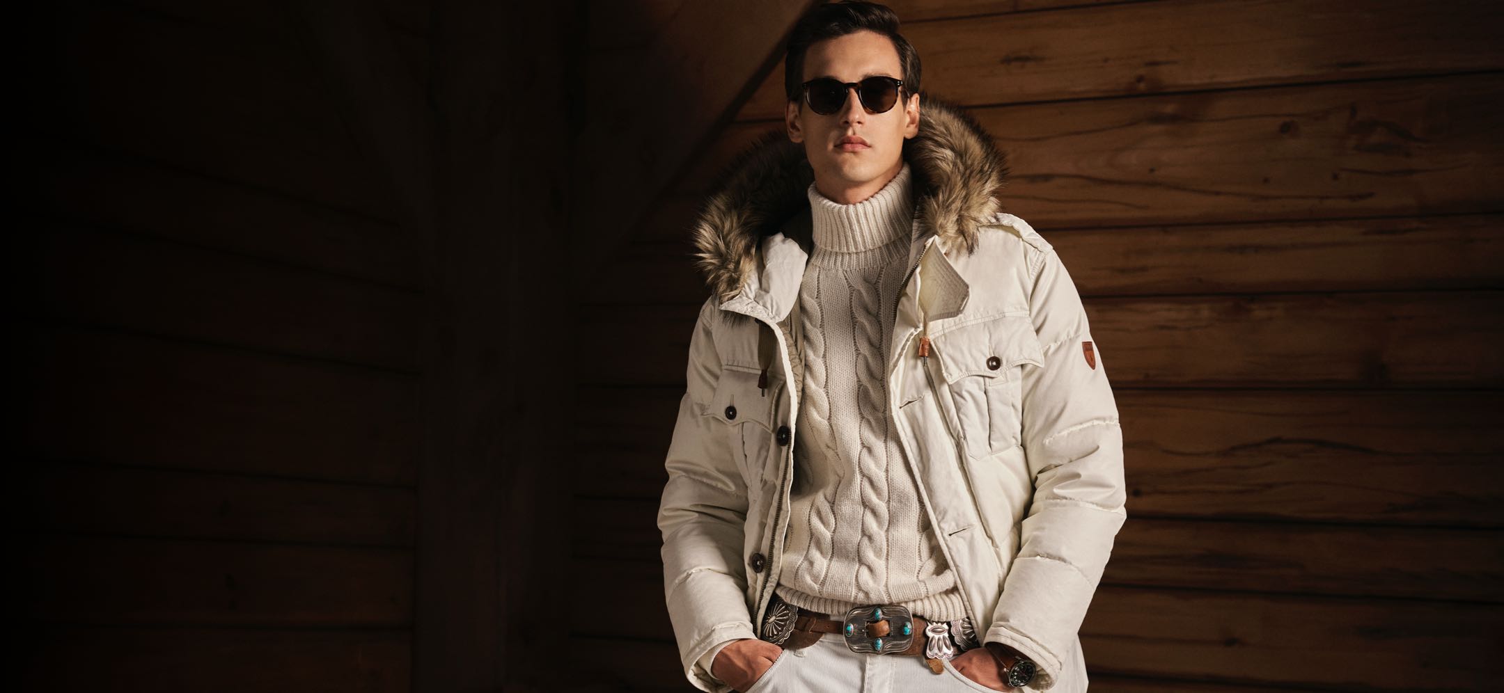 Man wears cream winter Polo outfit.