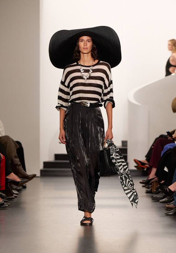 A look from Ralph Lauren’s Fall 2025 runway show shown on model.