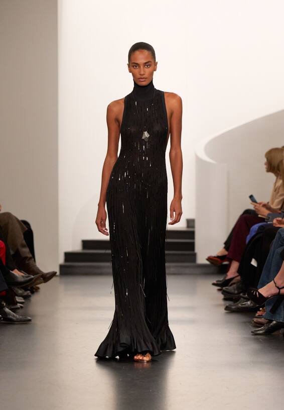 A look from Ralph Lauren’s Fall 2025 runway show shown on model.
